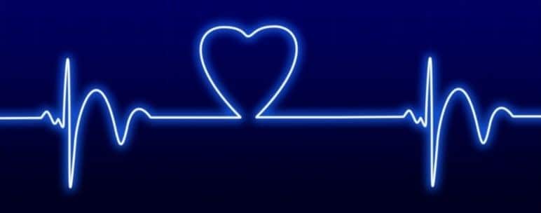 A glowing blue heart rate line on a dark background, with the line forming the shape of a heart in the center. A glowing blue heart rate line on a dark background, with the line forming the shape of a heart in the center