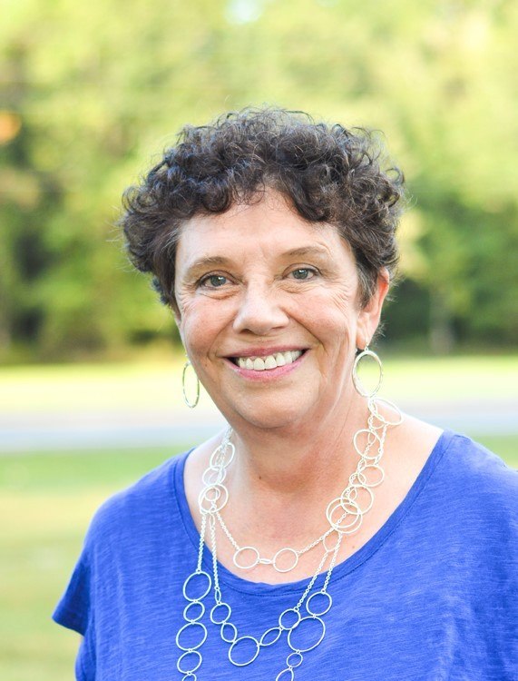 Portrait of Dr. Cindi Larimer outdoors, taken at Lake Butler Portrait of Dr Cindi Larimer outdoors, taken at Lake Butler around 2018